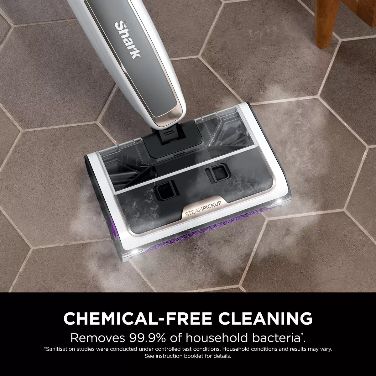 Front view of the dark grey Shark SteamPickUp SD200UK hard floor cleaner standing upright on its storage dock over light wood laminate flooring.
