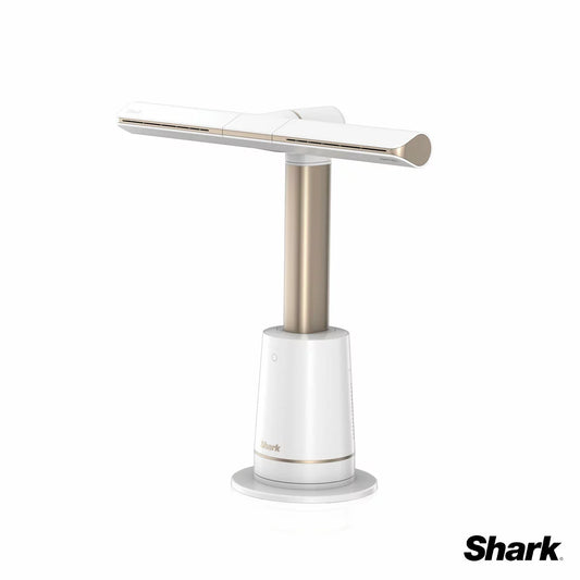 Shark TurboBlade multi-directional cooling fan, showcasing its adjustable head design on a modern office desk.