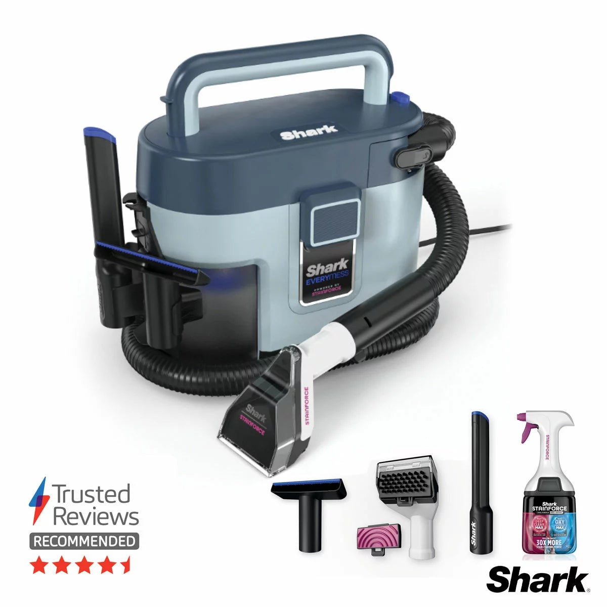 Front angle view of the charcoal grey Shark VX110UK EveryMess 3-in-1 vacuum with attached hose and crevice tool resting on a clean living room rug.