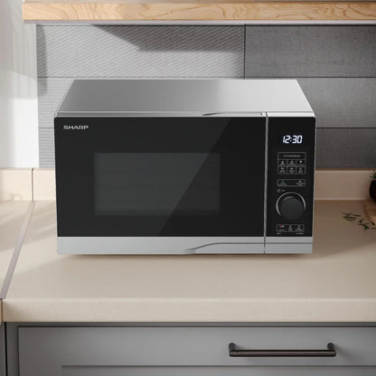 Sharp 20 Litre 700W Solo Digital Microwave with digital controls, compact 20L design, ideal for fast heating, reheating, and defrosting in small kitchens.