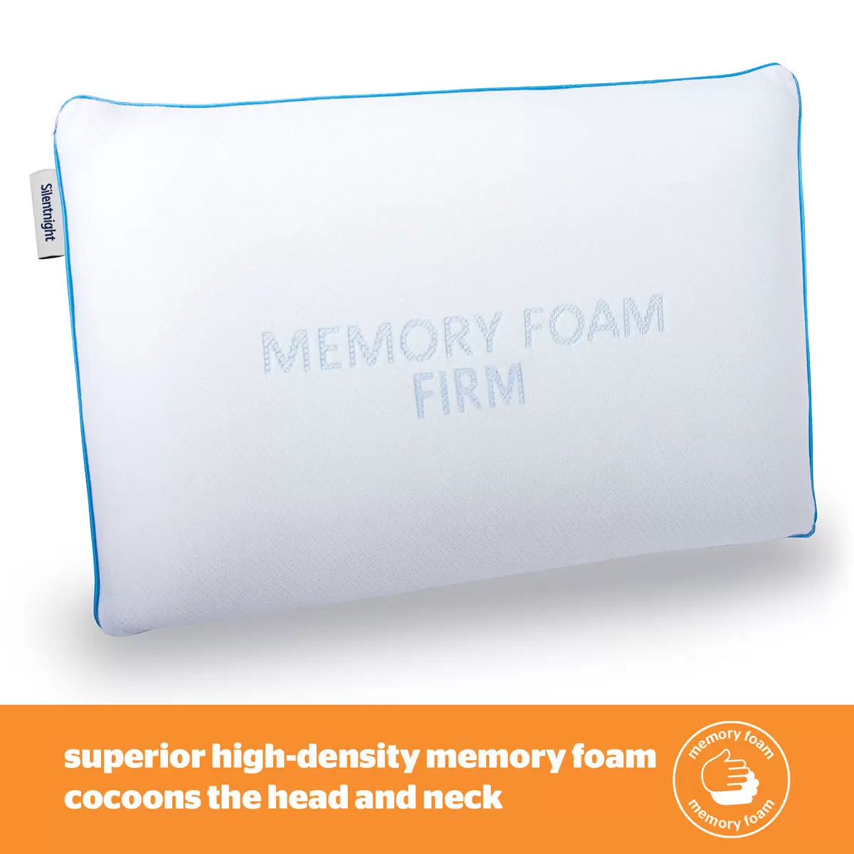 White Silentnight Impress firm memory foam pillow with textured removable cover shown at a three-quarter angle on a modern bed.
