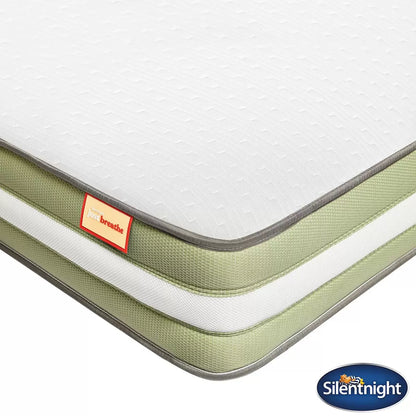 Side view of the rolled Silentnight Just Breathe single mattress showing the white soft-knit hypoallergenic cover and breathable 3D fabric border.