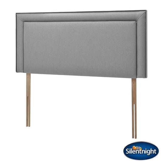 Front view of the Silentnight Malvern headboard in textured slate grey fabric attached to a modern bed frame in a light-filled bedroom.