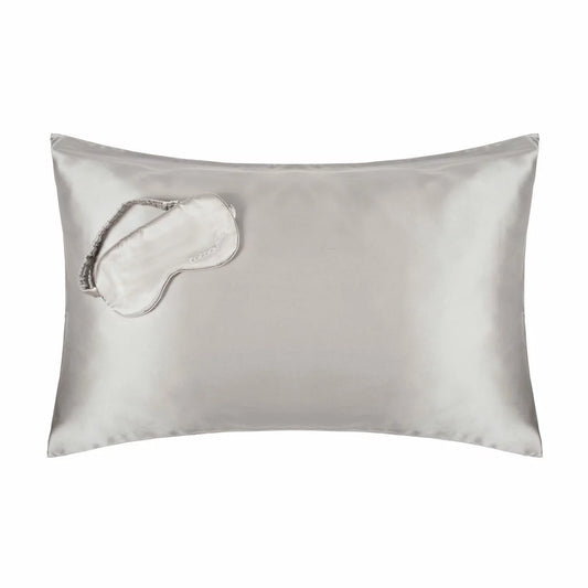 Cocoonzzz 100 percent Mulberry silk pillowcase and matching eyemask displayed in an elegant gift box on a white duvet.