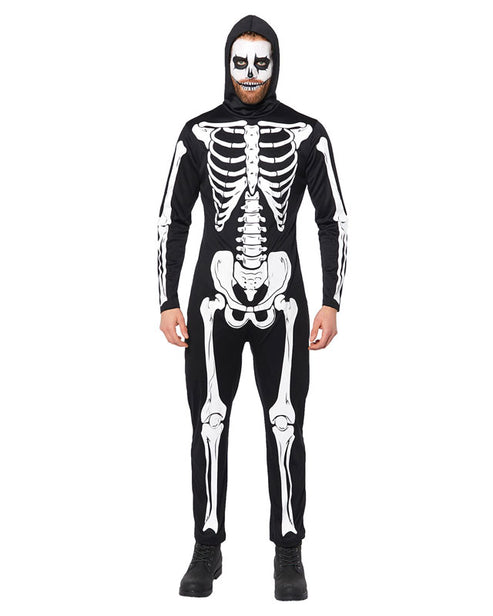 Adult wearing a full-body black skeleton suit costume with high-contrast white printed bones, standing against a dark neutral studio background.