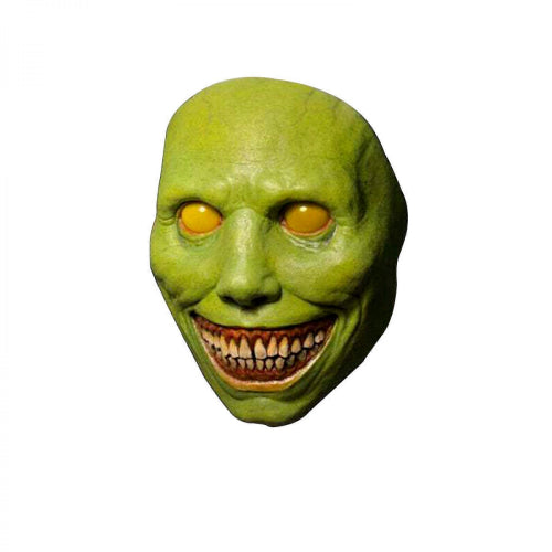 Front view of a green latex smiling demon mask featuring large black eye cutouts and an exaggerated wide toothy grin with red detail on a neutral background.