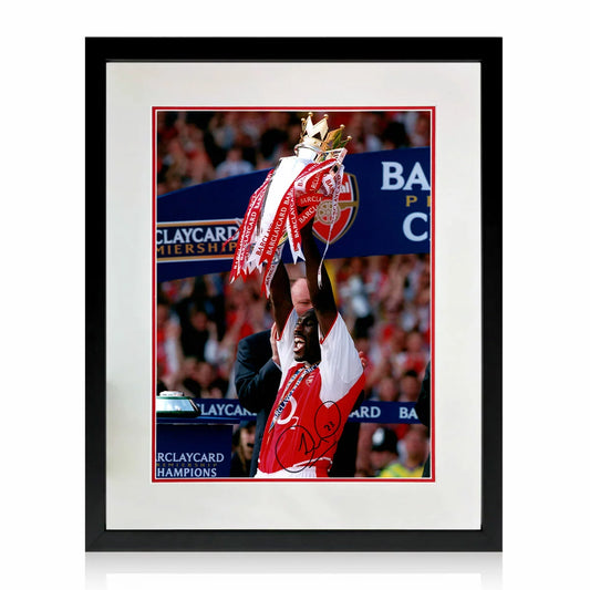 Close-up of Sol Campbell’s hand-signed signature on an authentic Arsenal FC framed photographic display.