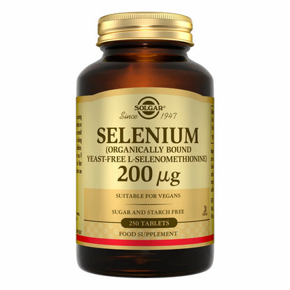 Front view of the brown glass Solgar Selenium 200mcg 250 tablets bottle with gold cap on a clean neutral surface.