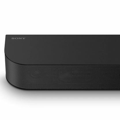 Sony HTS60 Bravia Theatre System 6 black soundbar, standalone wireless subwoofer, two rear satellite speakers, and compact control box arranged around a modern TV setup.