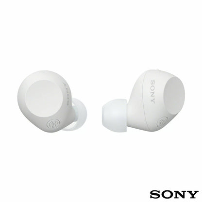 Front angle view of Sony WF-C710N Glass Blue wireless noise cancelling earbuds sitting beside their open charging case on a minimalist wooden desk.