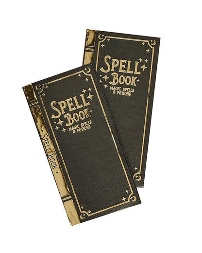 Flat lay view of twelve Spell Yeah! ancient spellbook-themed folded paper party napkins arranged on a dark wooden party table.
