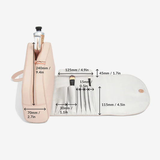 The Stackers Wrap Around Makeup Bag shown in an open position, highlighting the organized brush holders and large internal compartment against a soft, neutral background.