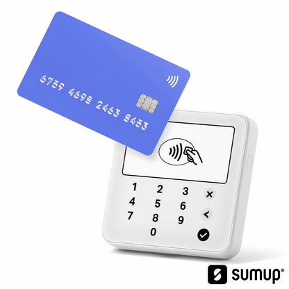 White SumUp Solo Lite compact card reader with digital screen displaying a payment prompt on a counter next to a smartphone.