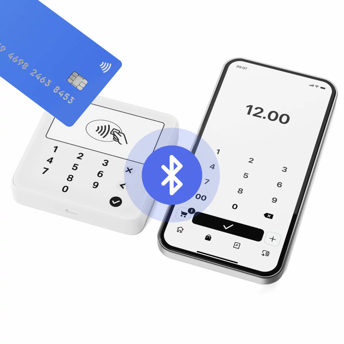 White SumUp Solo Lite compact card reader with digital screen displaying a payment prompt on a counter next to a smartphone.