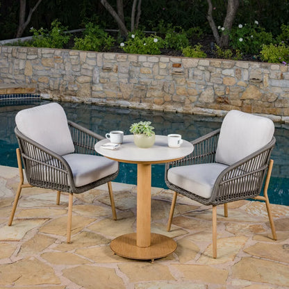 SunVilla Charme 3-Piece Bistro Set featuring honey oak finish chairs and a Permastone round table on a clean patio surface.
