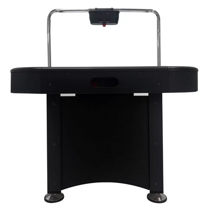 Full view of the black and silver Sure Shot Championship 7ft Air Hockey Table standing on thick braced legs, showing its illuminated white playing surface and overhead electronic scoring arch.