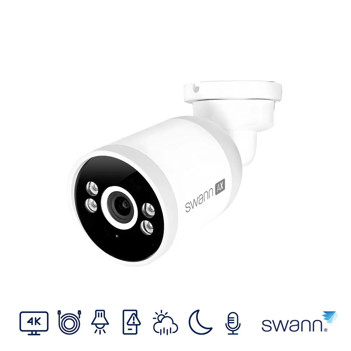 Profile view of the white and black Swann 4K bullet security camera mounted to a brick wall, showcasing its integrated LED spotlight, microphone port, and compact housing in an outdoor residential environment.