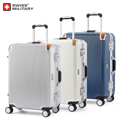 Front angle view of the Swiss Military 60cm medium hardside case showcasing its metallic finish, natural leather protective corners, and sleek aluminium edge frame.