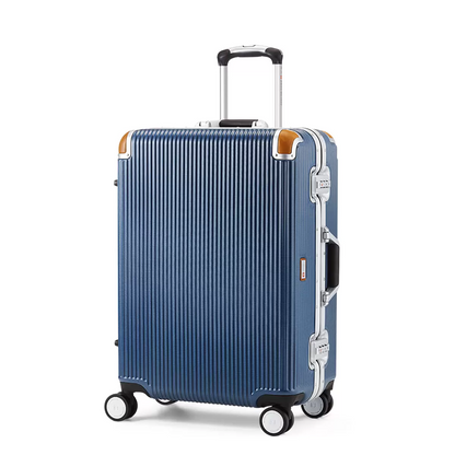 Front angle view of the Swiss Military 60cm medium hardside case showcasing its metallic finish, natural leather protective corners, and sleek aluminium edge frame.