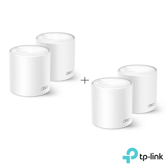 Pair of modern white cylindrical TP-Link Deco X50 mesh WiFi 6 units sitting side-by-side on a wooden side table in a contemporary living room environment.