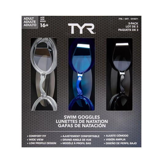 Three pairs of low-profile TYR adult swim goggles with clear anti-fog lenses and black silicone straps arranged neatly on a pool deck.