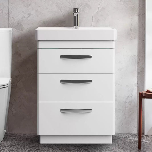 Front angle view of the Tavistock Curve 60cm floor mounted vanity unit featuring three smooth soft-close drawers with curved chrome handles and a deep white ceramic basin integrated into a modern bathroom setting.