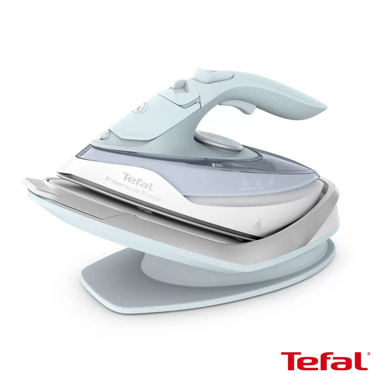 Tefal Freemove Power cordless steam iron FV6642G0 resting on its horizontal charging base with lock system on an ironing board.