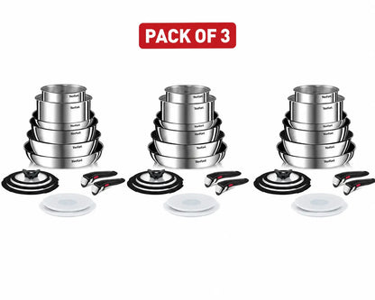 A 13-piece Tefal Ingenio Emotion stainless steel cookware set neatly stacked in a cupboard, demonstrating space-saving convenience.
