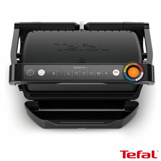 Tefal GC7178G1 OptiGrill+ Health Grill in sleek black stainless steel set on a kitchen countertop displaying illuminated cooking indicators and removable angled grill plates.