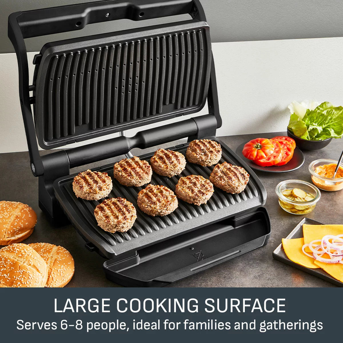 The Tefal OptiGrill XL in Matt Black sitting on a clean kitchen surface, showing the colour-coded cooking progress display and large grilling area.