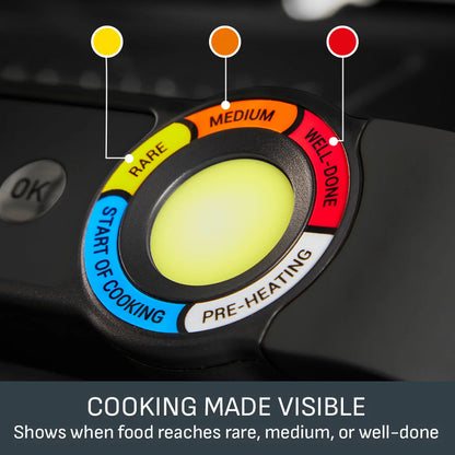 The Tefal OptiGrill XL in Matt Black sitting on a clean kitchen surface, showing the colour-coded cooking progress display and large grilling area.