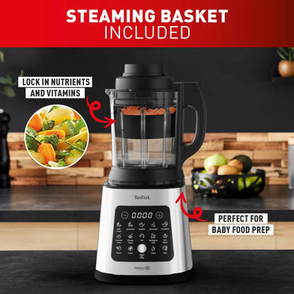 Front angle view of the stainless steel Tefal PerfectMix 2-in-1 blender with a thermal glass jug on a modern kitchen countertop displaying touch controls.