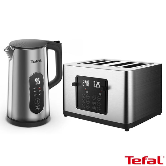Tefal Selection stainless steel electric kettle and matching 4-slot toaster set in Inox with illuminated LED digital touch controls placed on a kitchen counter.