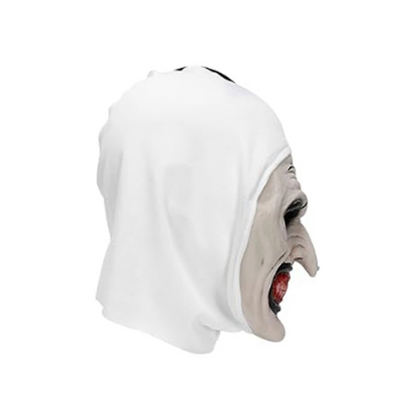 Full-head white silica gel Terrifier scary clown mask with sinister red grin on a mannequin torso in a Halloween haunted house setting.