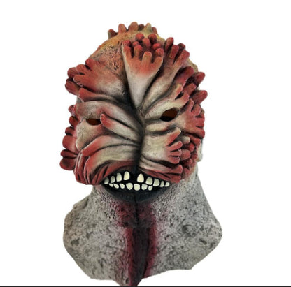 Detailed frontal view of a fungal Clicker latex horror mask showing realistic calcified spore growths and organic mutated texture.