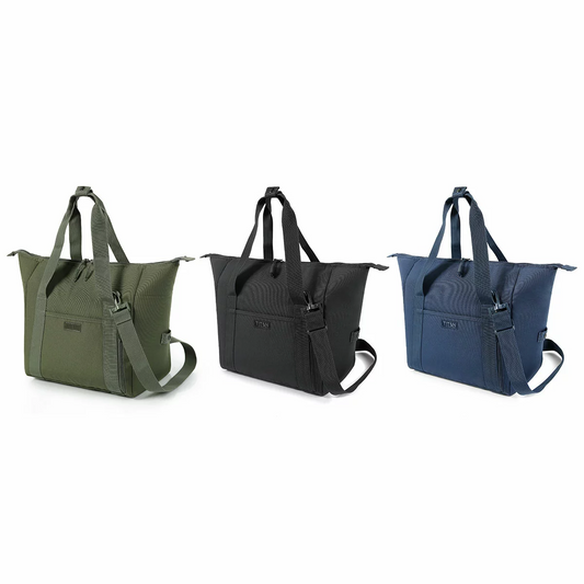 Three-quarter view of the heather grey Titan 25 Can Insulated Carry-ALL bag configured in flat horizontal duffel mode on a kitchen counter, showing the wide zipped opening.