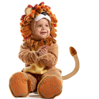 Front view of a toddler wearing a golden-brown plush lion costume with a plush mane hood, matching booties, and holding a striped plush zebra toy.