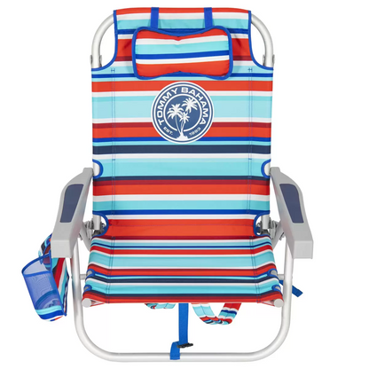 Lightweight blue woven polyester Tommy Bahama backpack beach chair with padded shoulder straps, drink holder, and integrated rear cooler pouch unfolded on a sandy beach.