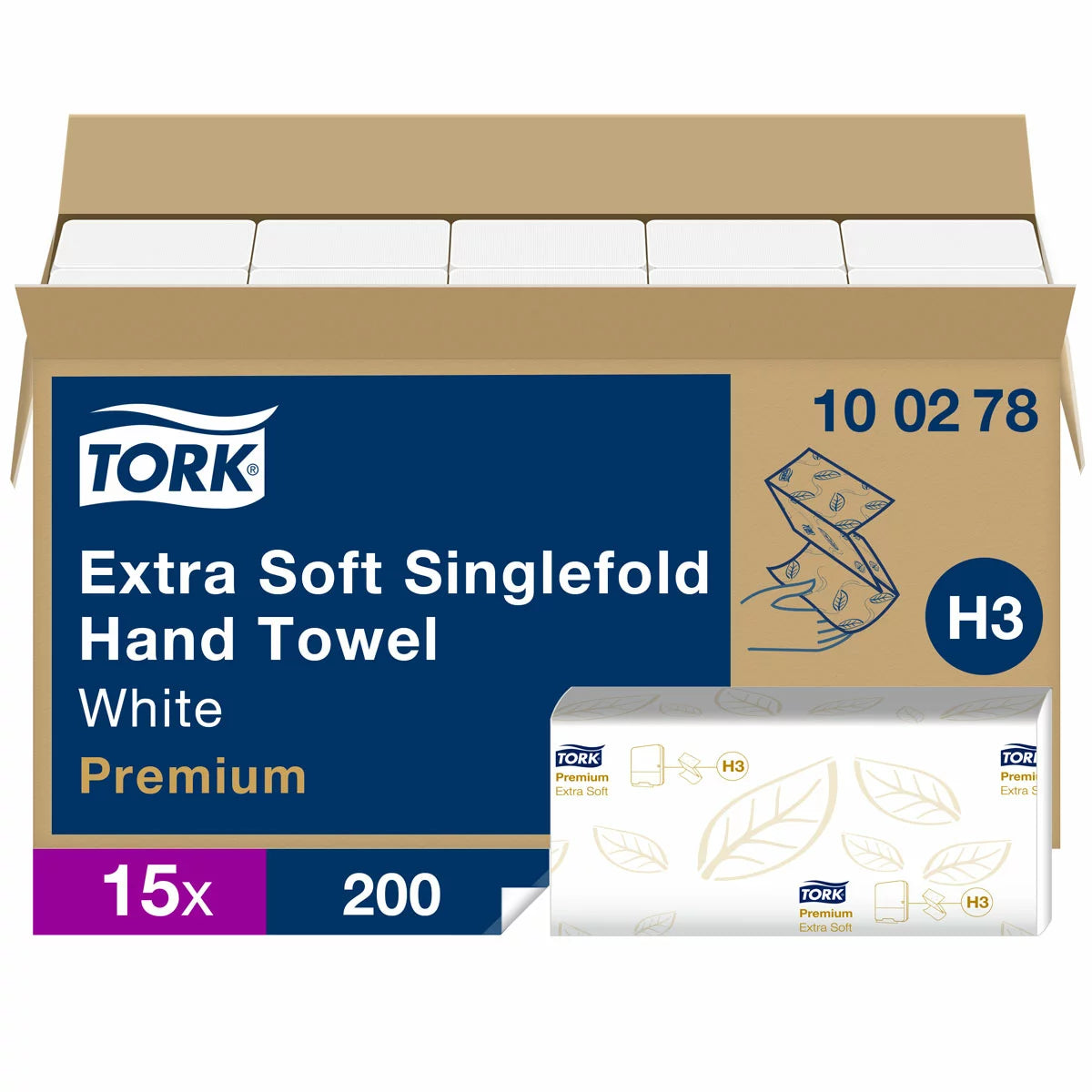 Stack of white Tork Premium Extra Soft Singlefold Hand Towels showing the detailed leaf pattern embossing next to a compatible H3 dispenser in a modern commercial restroom.