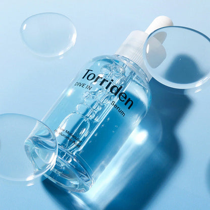 The Torriden Dive-in Serum collection, featuring two 50ml bottles and one 20ml travel bottle, displayed against a clean, professional background