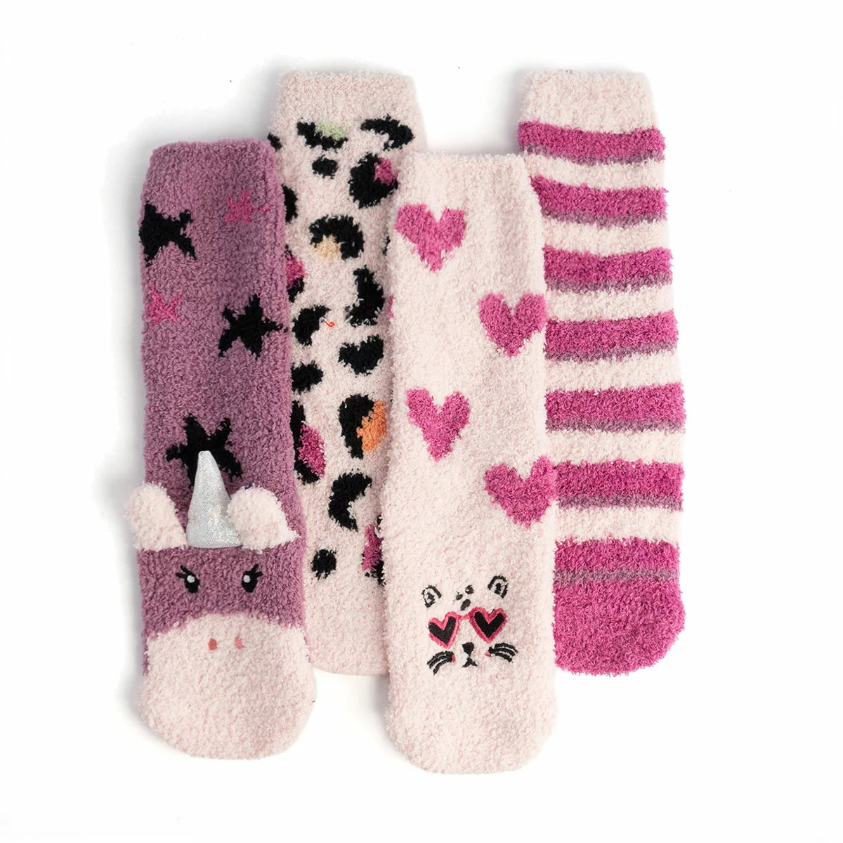 A set of four colourful Totes Toastie kids slipper socks in pink, red, and blue with non-slip grips neatly bound in a gift ribbon.