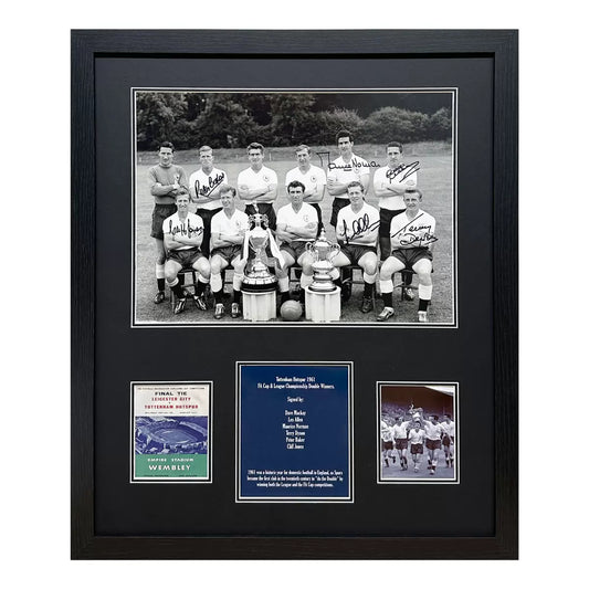 A professionally framed black and white photograph of the 1961 Tottenham Hotspur Double winning team, featuring six clear, authentic athlete signatures.