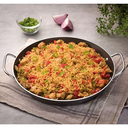 Tramontina 34cm non-stick paella pan for even cooking and easy family meal preparation