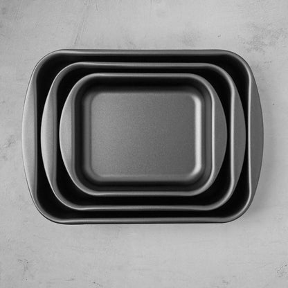 Tramontina 3 piece roasting pan set with durable oven-safe construction for roasting meats, vegetables, and family meals.