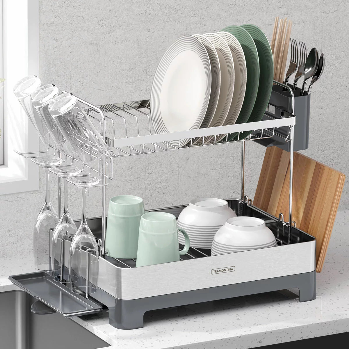 Tramontina 2-tier stainless steel dish rack neatly organised on a modern kitchen countertop.