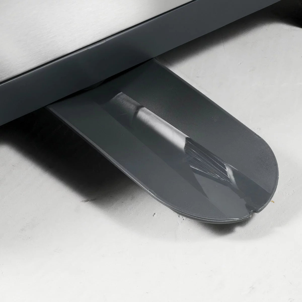 Tramontina 2-tier stainless steel dish rack neatly organised on a modern kitchen countertop.