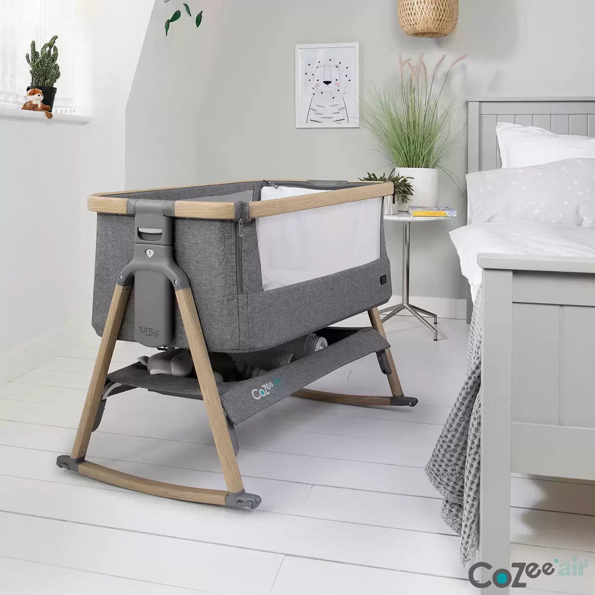 Tutti Bambini CoZee Air bedside rocking crib in oak and charcoal with breathable mesh sides for newborn sleep/1