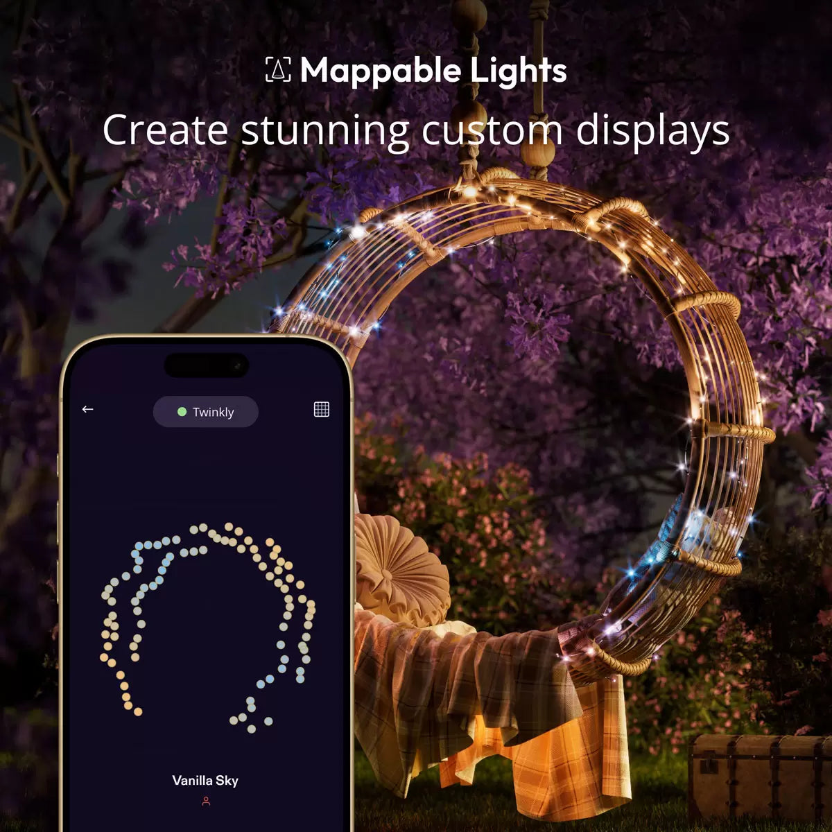 Long 48-meter strand of Twinkly Generation II 600 RGB plus White LED lights wrapped tightly around a large evergreen tree outdoors at dusk.
