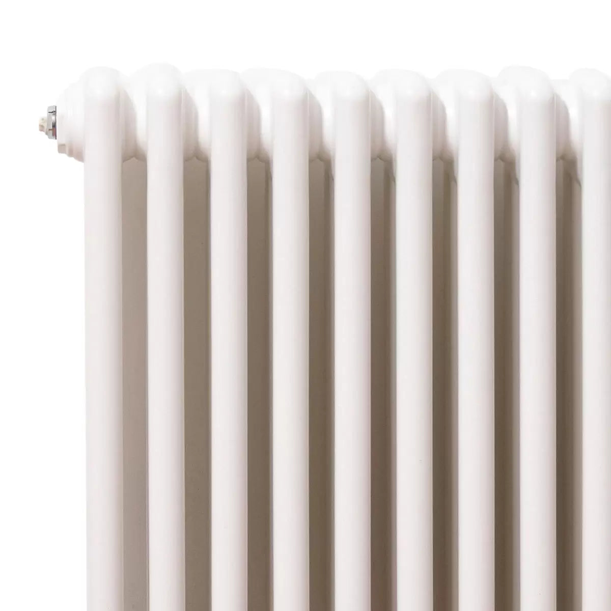 Vertical white 3-column steel radiator, 1800x465mm size, mounted on a light interior wall highlighting ten triple-tube sections.