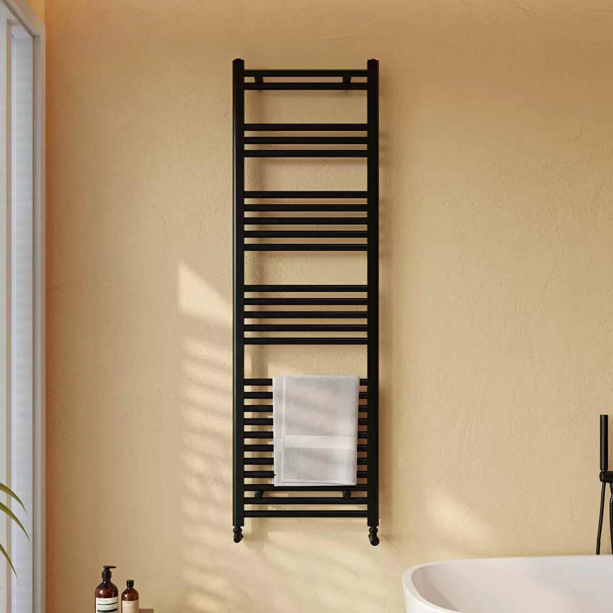 Vertical chrome Ultraheat Eco Rail heated towel radiator with 26 rails mounted on a tiled bathroom wall, 500x1585mm size front angle view.